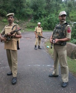 Cops on high alert along Basantgarh-Sangh road in Udhampur on Friday. — Excelsior/Rakesh