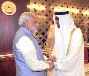 Prime Minister, Narendra Modi being received by the Crown Prince of Abu Dhabi, Sheikh Mohammed bin Zayed Al Nahyan, on his arrival at Abu Dhabi Airport on   Sunday.(UNI)