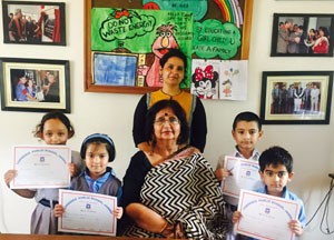 Winners of Poem Recitation competition posing alongwith Principal at Lawrence Public School in Jammu.