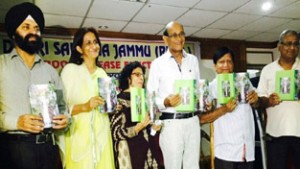 Anjali Sharma and others releasing Deepmala’s book at K L Saigal Hall on Thursday.