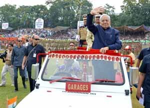 Chief Minister Mufti Mohammad Sayeed takes salute at Bakshi Stadium during Independence Day parade in Srinagar on Saturday.