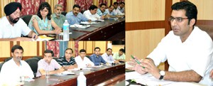 District Development Commissioner, Dr Shahid Iqbal Choudhary chairing a meeting at Udhampur on Saturday.