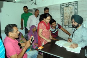 Dr Sandhu examining patients during free OPD by Fortis Ludhiana at Jammu on Monday.