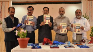 KU VC and others releasing magazine of Leh College on Friday.