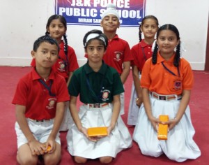 Winners of Poem Recitation competition posing for a group photograph at JKPPS in Jammu on Monday.