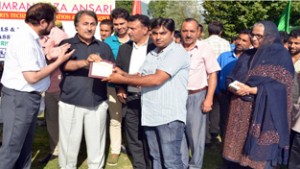  Dr Asgar Samoon, Divisional Commissioner, Kashmir and Jahangir Mir, DG Youth Services and Sports and other dignitaries during valedictory function of State Level Tennis Ball Cricket Tournament.