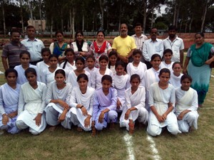 Participants of U-19 girls Inter-School Tournament posing aliongwith dignitaries in Reasi on Friday. 