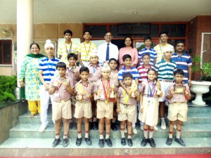 Skaters of Jodhamal School posing for a group photograph during felicitation function.  