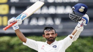 Ajinkya Rahane celebrating his century during the fourth day of second test cricket match against Sri Lanka in Colombo on Sunday. (UNI)