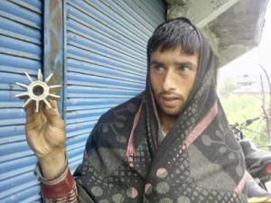 A civilian shows mortar shell that landed near his house at Sabzian in Poonch.  	—Excelsior/Harbhajan