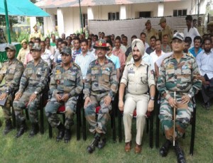 SP Headquarters Randheer Singh, Army officers and VDCs posing for photograph after meeting at Sub-Division R S Pura.