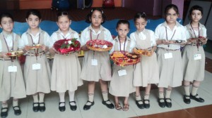 Participants of Inter Class Puja Thali competition posing for group photograph.