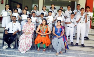 Medal winners of DPS Udhampur posing for group photograph with School faculty.