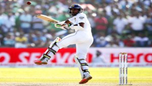 Sri Lanka’s Dinesh Chandimal plays a shot during his marathon knock on the third day of first test cricket match against India at Galle on Friday.