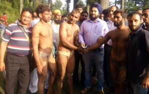 Tehsildar Ajeet Singh inaugurating bout during Wrestling Competition.