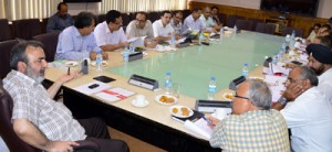 Chief Secretary, Iqbal Khandey chairing a meeting at Srinagar on Wednesday. 