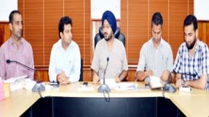 Deputy Commissioner Simrandeep Singh chairing a meeting at Jammu on Wednesday.