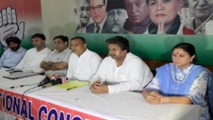 Senior PCC leaders Sham Lal Sharma, Raman Bhalla and others addressing joint press conference in Jammu. —Excelsior/Rakesh