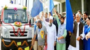 Chief Minister Mufti Mohammad Sayeed flanked by Minister for Health Ch Lal Singh flagging off ambulance at Srinagar on Wednesday.