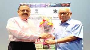 Union Minister Dr Jitendra Singh felicitating Aribam Syam Sharma, world renowned "Grand Prix" and "National Award" winning film maker from Manipur, during the 3-day Northeast Film Festival at Siri Fort Auditorium, New Delhi on Saturday.