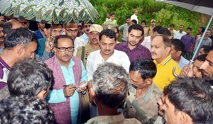 DyCM Dr Nirmal Singh interacting with landslide hit people. 