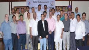 Members of J&K Offset Printers’ Association posing for group photograph on Monday.