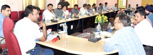 Minister for CAPD, Chowdhary Zulfkar Ali chairing a meeting at Jammu on Sunday. 
