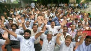 Estates employees holding protest demonstration in Jammu on Friday.  -Excelsior/ Rakesh 