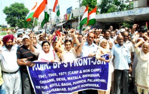 PoJK displaced persons holding protest demonstration near Press Club in Jammu on Monday.               -Excelsior/ Rakesh 