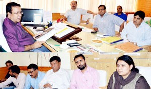 Minister for CA&PD Ch. Zulfkar Ali chairing a meeting at Srinagar on Friday.