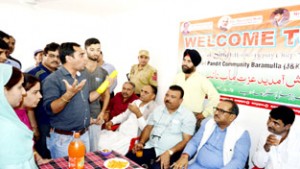 DyCM, Dr Nirmal Singh interacting with PM package employees at Pandit Colony in Sheeri area of North Kashmir’s Baramulla District on Thursday.   -Excelsior/Aabid Nabi