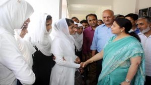 MoS Education, Priya Sethi interacting with students during her tour to GCW Anantnag on Saturday.