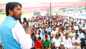 PCC president GA Mir addressing Cong convention at Anantnag on Sunday.