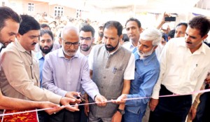 Minister for Education Nayeem Akhtar inaugurating new building of GDC Damhal Hanjipora on Tuesday.