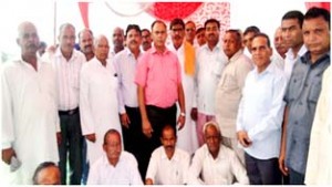 Members of Batwal Welfare Association during their meeting in Jammu on Monday. 