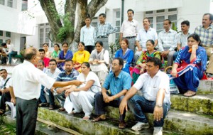 Teachers from Udhampur sitting in Vigilance office Jammu on Tuesday.— Excelsior/Rakesh