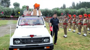 PHE Minister Sukhnandan Kumar Choudhary inspecting I-Day parade at Baramulla.