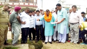 Minister of Industries & Commerce CP Ganga kick starting developmental works in Vijaypur on Friday.   -Excelsior/Gautam