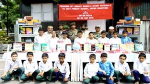 Students of Govt Primary School, Bhalkote after receiving books and other items from Army.