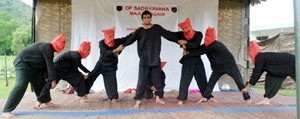 A scene from the play staged by Natrang at village Gulpur in district Poonch. 