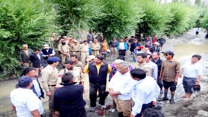 Minister for PHE, Sukhnandan Kumar Choudhary during his visit to flood affected village of Leh on Thursday.