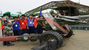 School children being briefed by a soldier about Army equipment at Military Station, Samba on Wednesday.