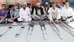 Members of Jammu and Kashmir Handicapped Association on a hunger strike in Srinagar on Friday. —Excelsior/Amin War