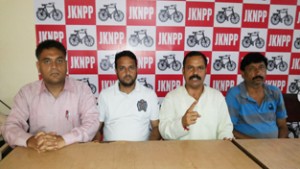 State president of NPP and Ex-MLA Balwant Singh Mankotia addressing press conference at Udhampur on Wednesday.