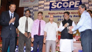 AN Jha receiving OISD Award from Dharmendra Pradhan at New Delhi.