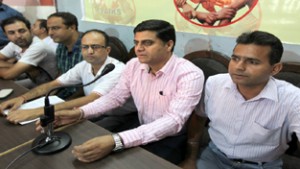 YAIKS president, R K Bhat along with others addressing a press conference at Jammu on Friday. — Excelsior/Rakesh