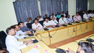 Vice Chairman State Advisory Board for Development of Kissans chairing a meeting of officers at Jammu on Friday.