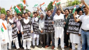 Activists of JKNPP led by Harshdev Singh, former Minister  holding massive demonstration against increased Pak mis-adventures on Sunday.