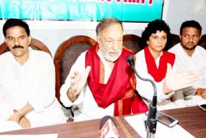 Chief patron of National Panthers Party Prof Bhim Singh addressing media persons at Jammu on Tuesday. -Excelsior/Rakesh