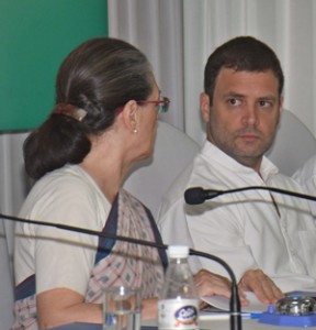 Congress president Sonia Gandhi in conversation with party’s vice president Rahul Gandhi during  the Congress Working Committee (CWC) meeting in New Delhi on Tuesday. (UNI)